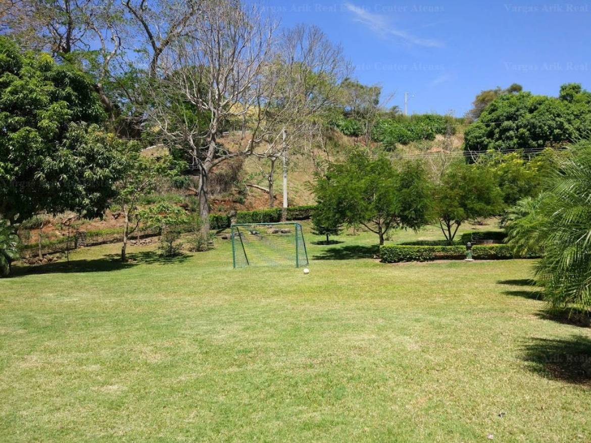 soccer field with big green area - Luxury Atenas property with an exceptional pool and lots of building space